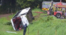 'The bus flipped and we all dropped to one side': Four students hospitalised after school bus overturns