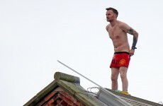 A convicted killer has come down off a prison roof after three days - for a pizza and a can of coke