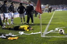 In video: Football match abandoned following violent paper-throwing incident
