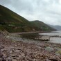 A Kerry coastal community is cut off following a cliff landslide