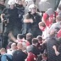 There were ugly scenes in Athens last night as police clashed with Bayern Munich supporters