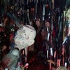Police find 3,714 knives, a shrine and fake body parts during terrifying arrest