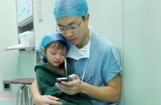 This picture of a doctor comforting a little girl before surgery will give you the feels