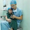 This picture of a doctor comforting a little girl before surgery will give you the feels