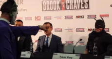 Boxer inexplicably dressed as Batman fights 'The Joker' at heavyweight title press conference