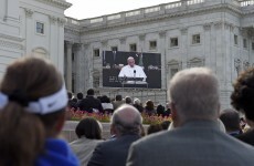 TV microphone catches woman threatening to throw shoe at pope's head