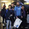 The wait is over: Apple fans sleep out and queue to get their hands on new iPhones