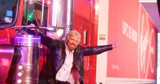 Richard Branson rode in on a massive truck and picked up one of our women