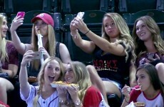 These girls are going viral for completely ignoring a game to take selfies