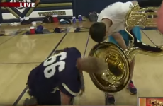 This reporter lost his mic down a tuba in the biggest facepalm moment ever