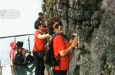 Terrifying experience for tourists as 394ft-high glass walkway cracks under their feet