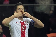 Lewandowski sends Ireland to the playoffs after chaotic night in Warsaw