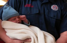 Baby boy visits firefighters who helped deliver him last week