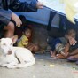 Teenage boy crushed to death as typhoon in Philippines forces thousands to flee