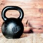Man who attempted to murder wife with kettlebell has his jail term cut
