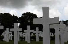 High school football coach makes his team lie in graves
