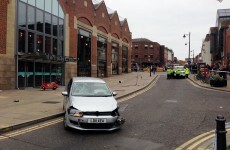 Two children injured after pensioner drives onto pavement