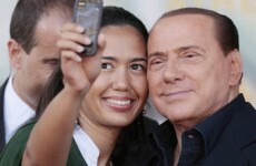 Berlusconi jokes about Hitler, advises young women to marry rich old men