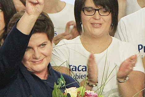 Conservative Law and Justice candidate for the Prime Minister Beata Szydlo celebrates 
