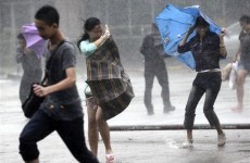 Asia reels from floods as storm hits Vietnam