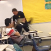 Police officer who threw student across classroom has been sacked