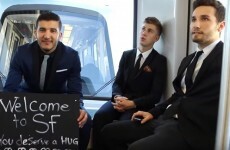 These lads went down to an airport just so they could greet strangers coming off their flights
