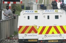 Police ambushed with paint and petrol bombs while investigating hoax device