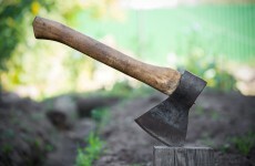 A man used a hatchet to steal cigarettes and cash
