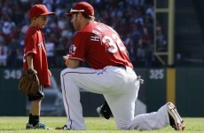 Son of fallen fan throws first pitch of playoffs