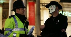 Thousands take to the streets in Guy Fawkes masks in centre of London