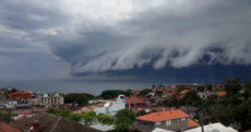 Watch: Ominous shelf cloud rolls in over Sydney beach