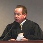 Judge accused of asking an FBI agent to spy on his family in exchange for free beer