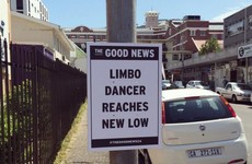 This guy puts a positive spin on headlines and sticks them up around his town