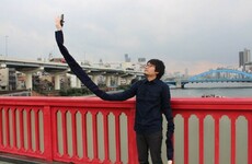 This man thinks selfie sticks are embarrassing, so he made a 'selfie arm'