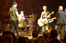 Bono brought up a tiny U2 fan to sing and play guitar on stage in Belfast last night
