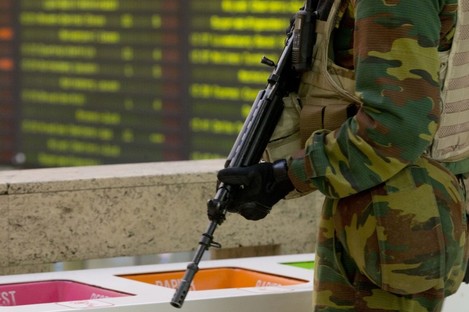 A Belgian Army soldier patrols the central train station in Brussels today. 