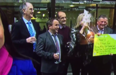 A Lotto winner blitzed herself in the face with champagne on the Six One News