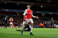 Goals from Özil and Sanchez keep Gunners' Champions League hopes alive