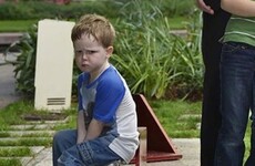 This kid was NOT in the mood for posing for the family Christmas card
