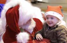 Santa uses sign language to make sure he gets this toddler's wish list