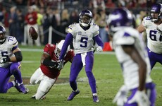 Cardinals defence swoops late to pick off Vikings and secure playoff berth