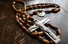 Priest welcomed home after apology over false rape allegations
