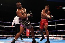Anthony Joshua survives Whyte scare to extend perfect pro record