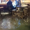Photo: Two Cork lads sip pints as Storm Frank floods the pub around them