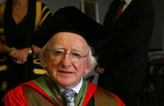After calling in help, President Higgins has signed 'rushed' new asylum laws