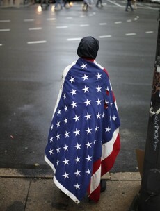 Occupy Wall Street protests continue - and draw overseas attention