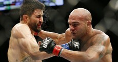Lawler survives epic Condit contest to retain his UFC title via split decision