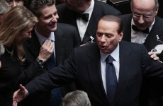 Berlusconi scrapes through confidence vote in Italian parliament