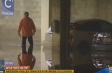This man was caught on camera at the exact moment he found his car in a flooded car park