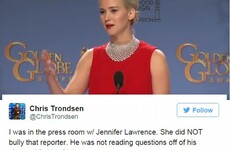 A journalist has stuck up for J-Law after her 'rude' Golden Globes behaviour... It's The Dredge